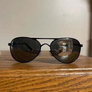 Oakley given sunglasses.  Polarized.